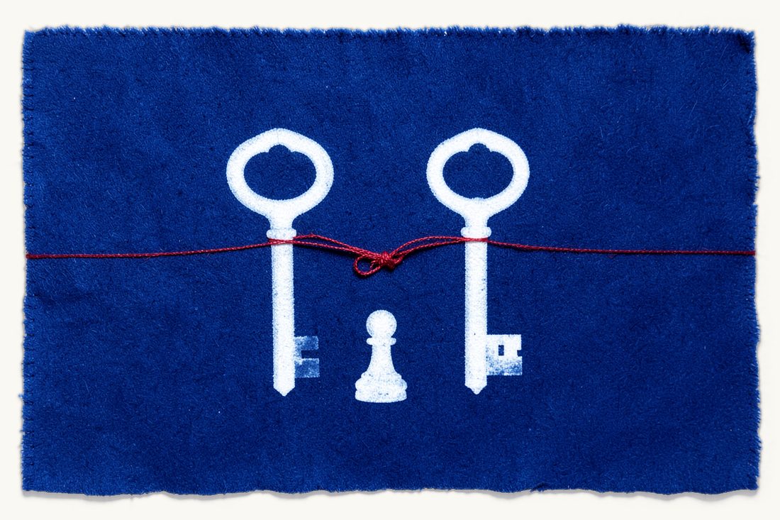 Turkish citizenship for foreigners: two identical old keys lying side by side with one red thread through both bows knotted together and a small chess pawn below, cyanotype print
