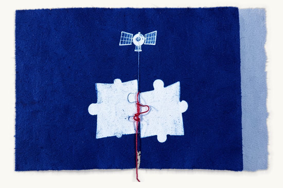 Policy responses to anti-satellite weapons: a small satellite above two large interlocking jigsaw pieces held by a red thread knot, cyanotype print