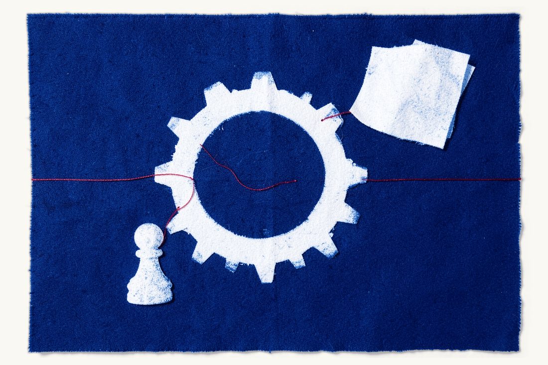 How the ISTAC Arbitration Rules work: a large gear wheel with a red thread running round its teeth from a small chess pawn to a folded sheet, cyanotype print