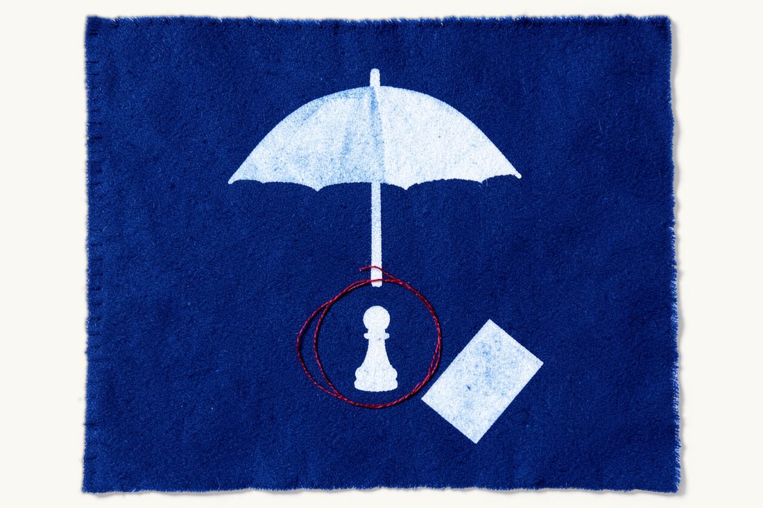 Reducing personal risk for board members: a large open umbrella above a chess pawn encircled by a red thread ring, with a document folder just outside the ring, cyanotype print