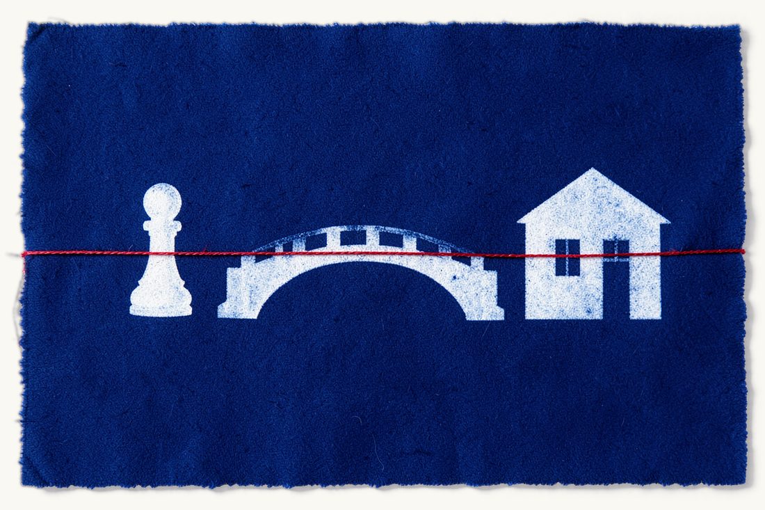 Buying property in Türkiye as an American: a chess pawn and a large house at the two ends of an arched bridge, joined by a red thread along it, cyanotype print