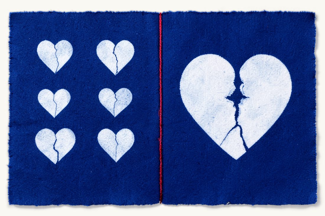 Special and general divorce grounds compared: six small cracked hearts in neat rows on one side of a vertical red thread, one large cracked heart on the other, cyanotype print