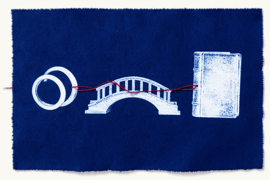 Which forum recognises a foreign divorce: two plain wedding rings lying apart, a red thread over an arched bridge to a thick antique book, cyanotype print