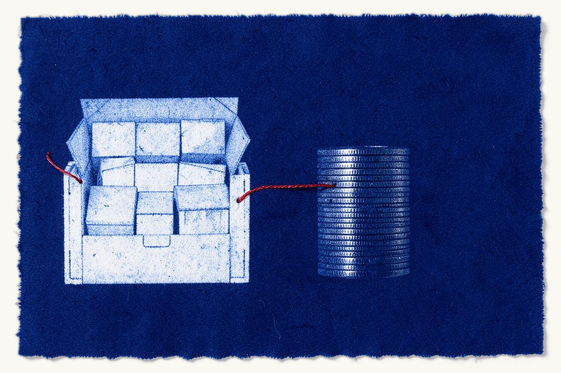 Customs valuation of imported goods: an open crate of boxes linked by a red thread to a tall stack of silver coins seen from the side, cyanotype print
